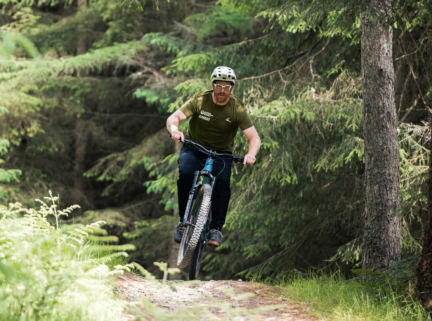 Will Clarke riding a trail